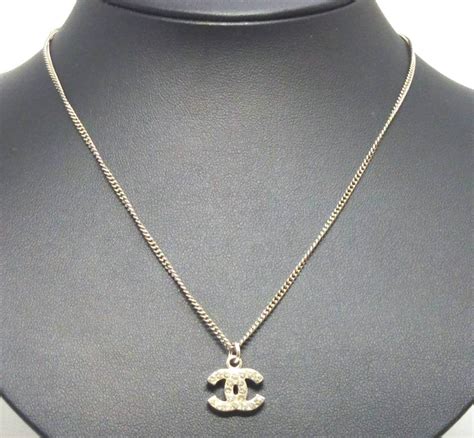 silver chanel pendant